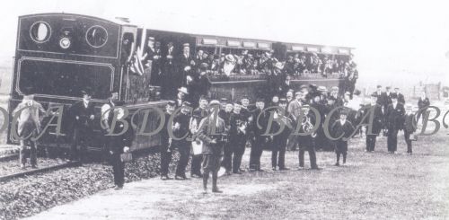 58   steam train carriage and people