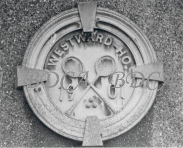 58  127  tennis club sign above door