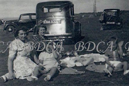 58 .3  women with children cars tors