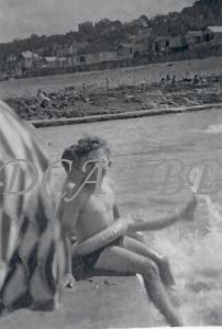 58 .6  child in rock pool